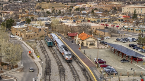 DXP002_130_0007 - Aerial stock photo of A passenger train at the station in Santa Fe, New Mexico