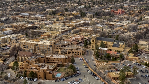 DXP002_130_0011 - Aerial stock photo of Two hotels and a cathedral in Santa Fe, New Mexico