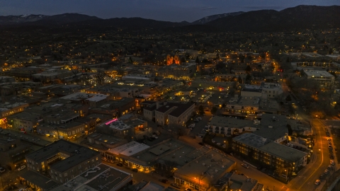 DXP002_132_0005 - Aerial stock photo of A view across downtown to cathedral at night, Santa Fe, New Mexico