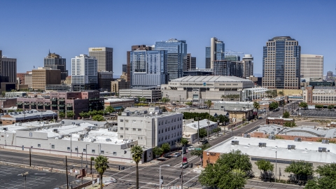 DXP002_136_0003 - Aerial stock photo of Arena and office buildings in Downtown Phoenix, Arizona