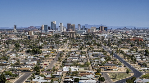 DXP002_136_0010 - Aerial stock photo of A view of the city's distant skyline, Downtown Phoenix, Arizona