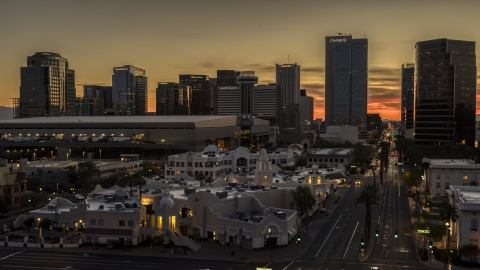 DXP002_139_0006 - Aerial stock photo of The city's office high-rises at sunset in Downtown Phoenix, Arizona