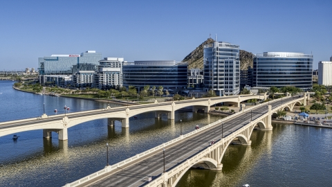 DXP002_142_0005 - Aerial stock photo of Bridges leading to waterfront office buildings in Tempe, Arizona
