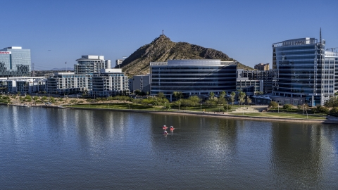 DXP002_142_0007 - Aerial stock photo of A riverfront condominium complex and modern office buildings in Tempe, Arizona