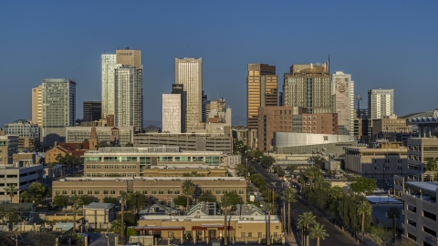 DXP002_143_0004 - Aerial stock photo of The city's skyline at sunset in Downtown Phoenix, Arizona
