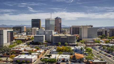 DXP002_144_0003 - Aerial stock photo of A view of a group of tall high-rise office buildings, Downtown Tucson, Arizona