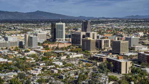 DXP002_144_0009 - Aerial stock photo of A pair of tall high-rise office towers and city buildings in Downtown Tucson, Arizona