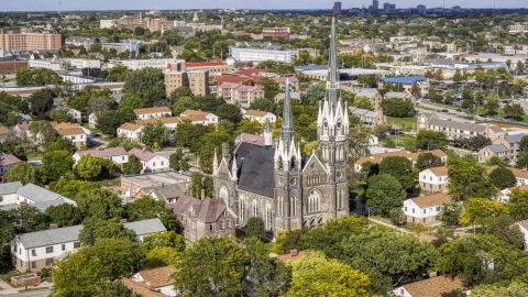 DXP002_152_0005 - Aerial stock photo of A church with tall steeples in Milwaukee, Wisconsin