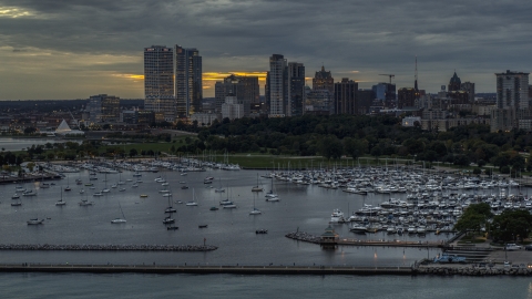 DXP002_155_0003 - Aerial stock photo of Marina and the city's skyline at twilight, Downtown Milwaukee, Wisconsin