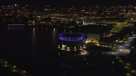 DXP002_157_0003 - Aerial stock photo of Discovery World museum at night, Downtown Milwaukee, Wisconsin