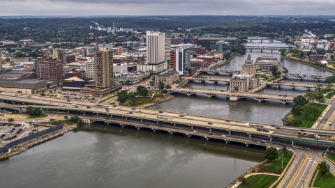 DXP002_164_0005 - Aerial stock photo of Bridges spanning the river by Downtown Cedar Rapids, Iowa