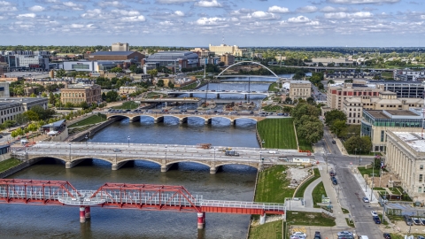 DXP002_165_0006 - Aerial stock photo of A view of of several bridges spanning the river in Des Moines, Iowa