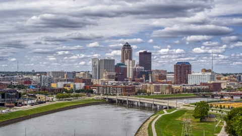 DXP002_165_0011 - Aerial stock photo of The skyline across the river, seen from a park, Downtown Des Moines, Iowa