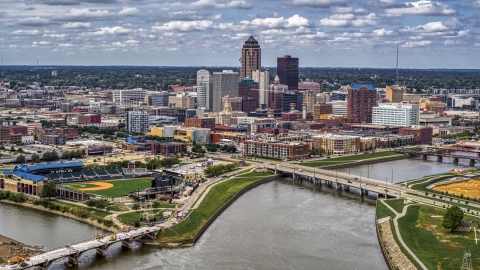 DXP002_165_0014 - Aerial stock photo of The city's skyline across the river, Downtown Des Moines, Iowa