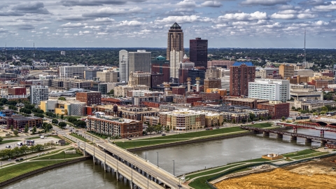 DXP002_165_0015 - Aerial stock photo of The city's skyline and bridges over the river, Downtown Des Moines, Iowa