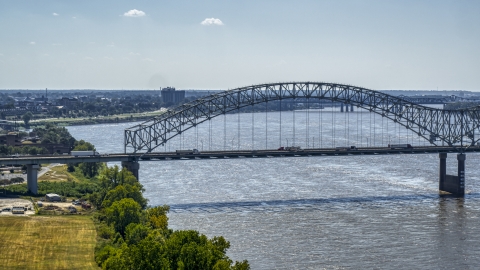 DXP002_177_0003 - Aerial stock photo of A bridge spanning the Mississippi River, Memphis, Tennessee