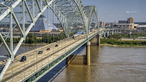 DXP002_177_0008 - Aerial stock photo of Cars crossing the bridge to Memphis, Tennessee
