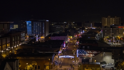 DXP002_188_0002 - Aerial stock photo of Busy Beale Street at nighttime, Downtown Memphis, Tennessee