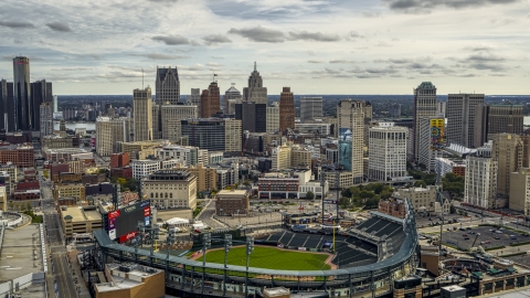 DXP002_191_0005 - Aerial stock photo of Comerica Park baseball stadium and the skyline, Downtown Detroit, Michigan