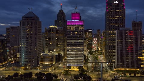 DXP002_193_0008 - Aerial stock photo of The One Woodward Avenue skyscraper at twilight, Downtown Detroit, Michigan