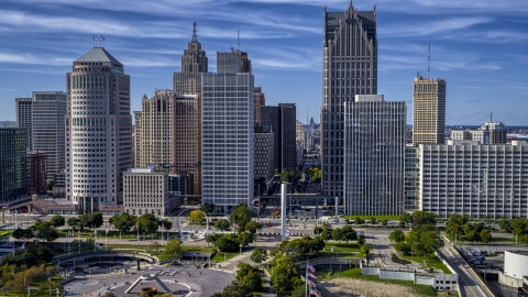 DXP002_196_0001 - Aerial stock photo of Towering skyscrapers across from Hart Plaza, Downtown Detroit, Michigan