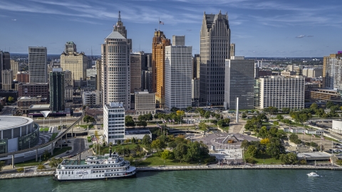 DXP002_196_0005 - Aerial stock photo of Tall skyscrapers and Hart Plaza, Downtown Detroit, Michigan
