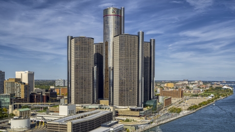 DXP002_196_0006 - Aerial stock photo of The GM Renaissance Center beside the river in Downtown Detroit, Michigan