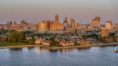 DXP002_204_0013 - Aerial stock photo of A view of city hall and office buildings at sunset, seen from waterfront condos, Downtown Buffalo, New York