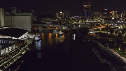 DXP002_205_0005 - Aerial stock photo of The river toward the downtown skyline at night, Downtown Buffalo, New York