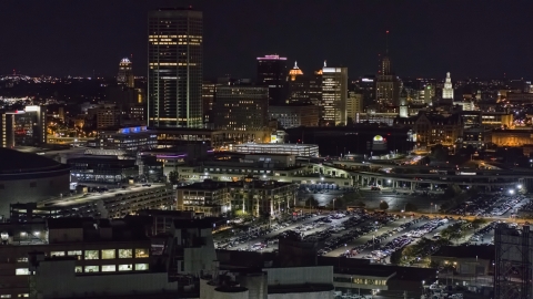 DXP002_205_0007 - Aerial stock photo of The skyline seen from parking lots at night, Downtown Buffalo, New York