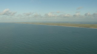 AF0001_000171 - HD aerial stock footage of a view of the Matagorda Peninsula, Texas while flying over the Gulf of Mexico