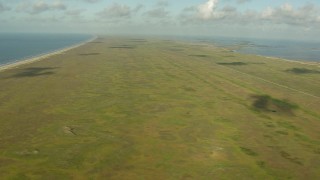 AF0001_000172 - HD aerial stock footage of Matagorda Peninsula seen while flying over the Gulf of Mexico, Texas