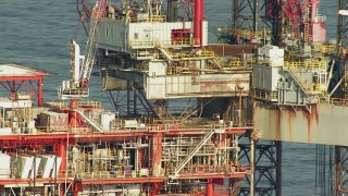 AF0001_000181 - HD aerial stock footage of a close up view of an oil rig in the Gulf of Mexico