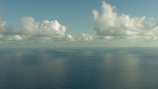 AF0001_000185 - HD aerial stock footage fly over the Gulf of Mexico and pan across the water