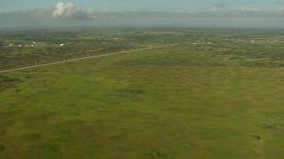 AF0001_000205 - HD aerial stock footage flyby countryside, farms, and a country road in Matagorda County, Texas