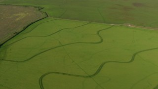 AF0001_000208 - HD aerial stock footage flyby a creek to reveal farm fields in Matagorda County, Texas