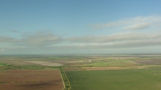 AF0001_000210 - HD aerial stock footage of a view across farm fields in Matagorda County, Texas