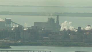 AF0001_000216 - HD aerial stock footage of Alcoa Aluminum Plant next to Lavorna Bay, Point Comfort, Texas