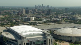AF0001_000256 - HD aerial stock footage fly over NRG Stadium and Houston Astrodome near Downtown Houston, Texas