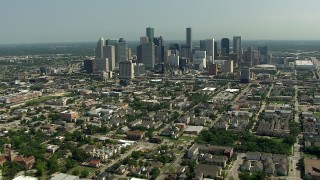 AF0001_000260 - HD aerial stock footage of a view of the city skyline, and zoom to a closer view, Downtown Houston, Texas