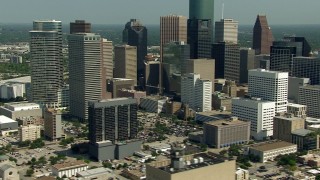 AF0001_000273 - HD aerial stock footage of panning across city skyscrapers in Downtown Houston, Texas