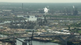 AF0001_000278 - HD stock footage aerial video of a view of an oil refinery seen while passing the 610 Bridge in Harrisburg, Manchester, Texas