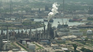 AF0001_000279 - HD aerial stock footage of riverfront oil refinery by Buffalo Bayou in Harrisburg, Manchester, Texas