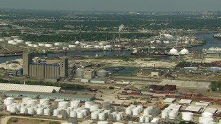 AF0001_000284 - HD stock footage aerial video of flyby an oil tanker and refineries around Buffalo Bayou in Harrisburg, Manchester, Texas