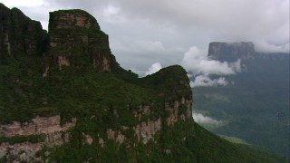 AF0001_000588 - HD aerial stock footage video of rugged mountains and lush jungle in Southern Venezuela