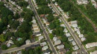 AF0001_000702 - HD aerial stock footage of a bird's eye view of residential neighborhoods in Hyde Park, Massachusetts