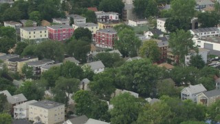 AF0001_000706 - HD aerial stock footage of apartment buildings in Hyde Park, Massachusetts