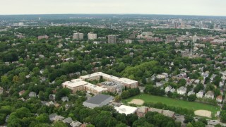 AF0001_000712 - HD aerial stock footage fly over Brookline High School and residential neighborhoods, Brookline, Massachusetts