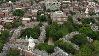 AF0001_000717 - HD aerial stock footage flyby Eliot House, Lowell House and campus buildings at Harvard University, Cambridge, Massachusetts