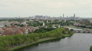 AF0001_000723 - HD aerial stock footage fly over Charles River toward Eliot House at Harvard University, Cambridge, Massachusetts